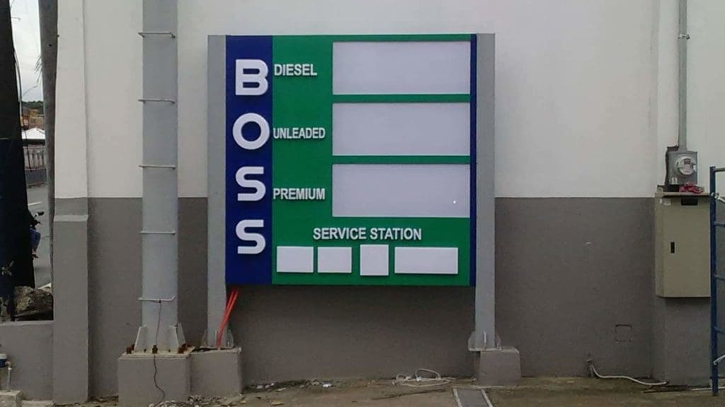 Fuel price signage for BOSS Service Station in Quezon City, metallic outdoor sign with blank rates, by M&G Global Ads.